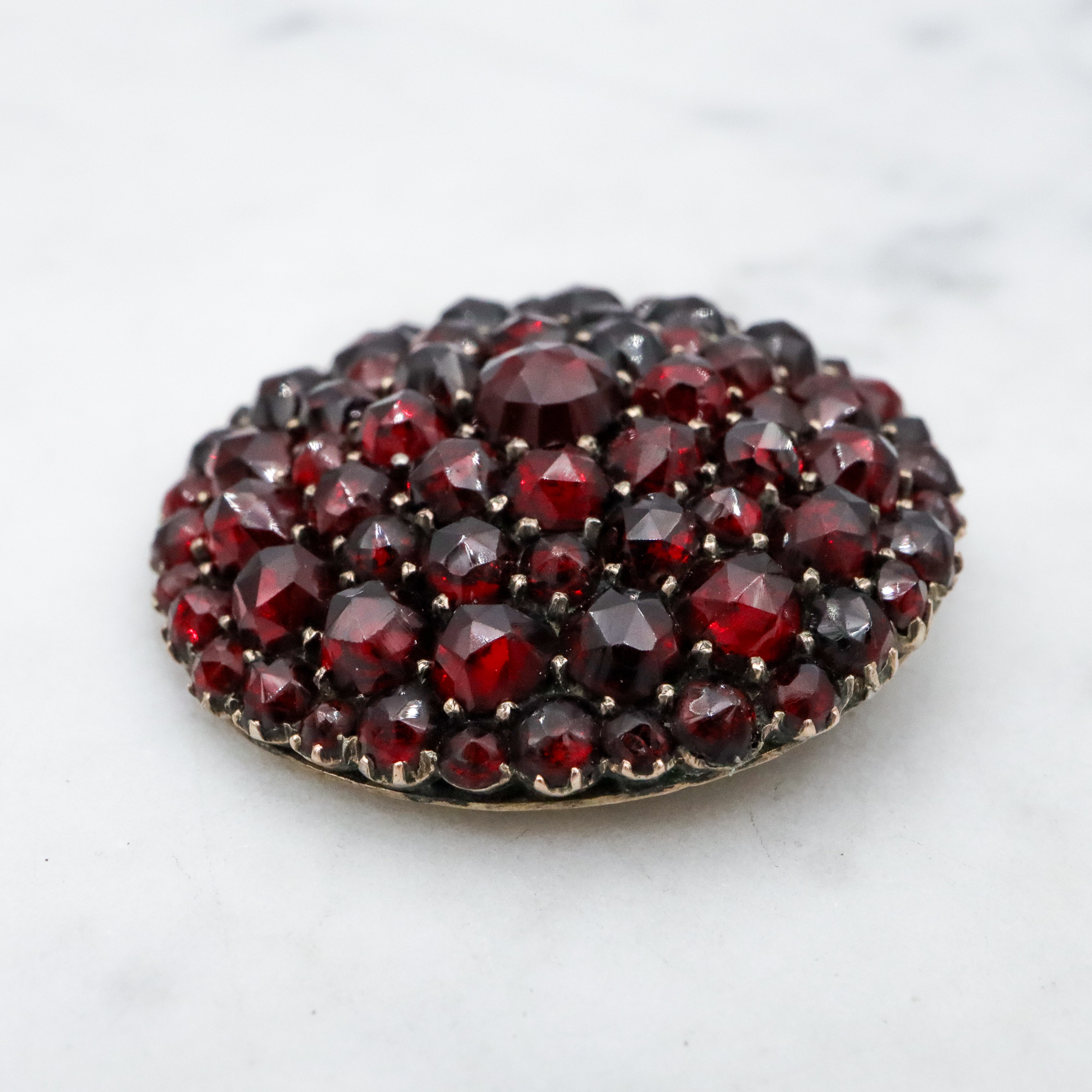 Antique Victorian gilt silver Bohemian garnet domed circle pendant